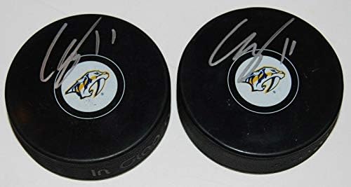 Eli Tolvanen potpisao je suvenirni hokejaški pak s logotipom mumbo - NHL pak s autogramima